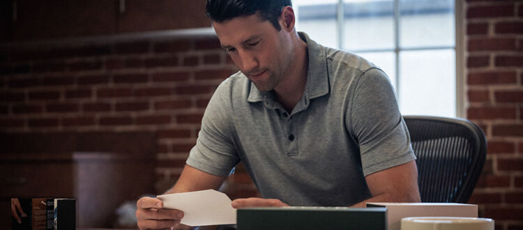 Man reading about bankruptcy
