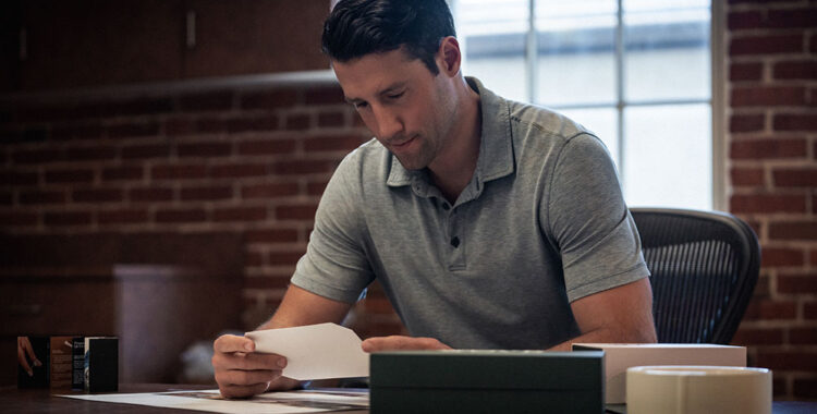 Man reading about bankruptcy